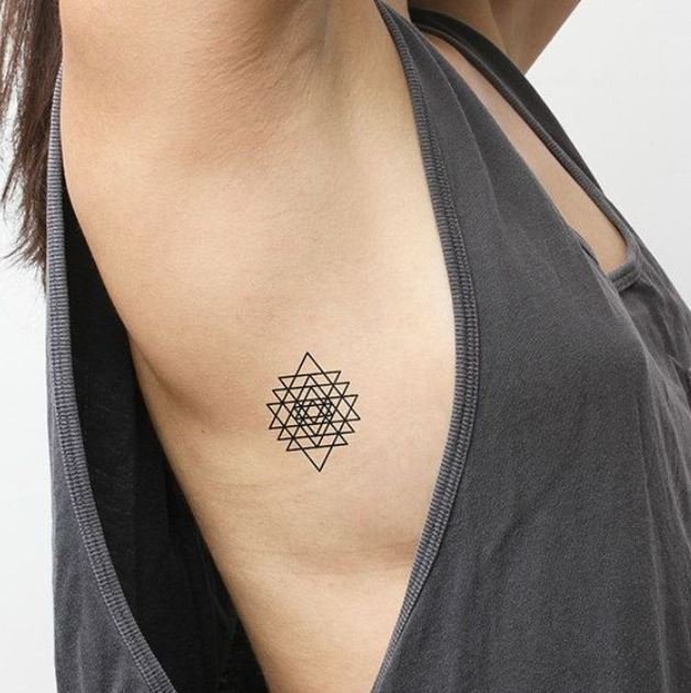geometric tattoo on woman